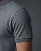 Grey polo t shirt sleeve close up