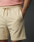 Knee length off white shorts